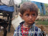 Rajasthani migrants in Narsapur village near temple