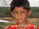 Rajasthani migrants in Narsapur village near temple
