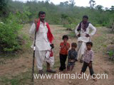 Rajasthani migrants in Narsapur village near temple