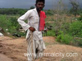 Rajasthani migrants in Narsapur village near temple